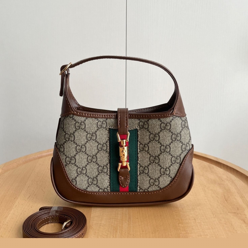 G*u*i top handle bags